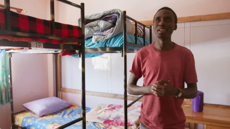 Nairobi, Kenya - Henry Onyango, founder of Roometo, gives a tour of university accommodations. (Credit: Future of Work Film Inc)