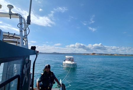 A Civil Guard patrol boat tows a recreational vessel that was adrift in Gerona, Catalonia, Spain. (National Geographic/Jose Antonio Gavilán Tobal)