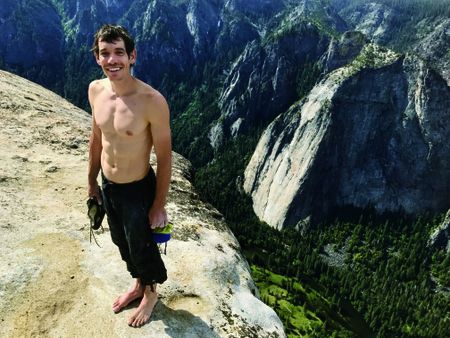 Holding all his climbing gear-his shoes and bag of chalk-Honnold stands atop El Capitan four hours after he began scaling it. "At the bottom, I was a little nervous," he said afterward. "I mean, it's a freaking-big wall above you." So what's next? "I still want to climb hard things. Someday. You don't just retire as soon as you get down." (Jimmy Chin)