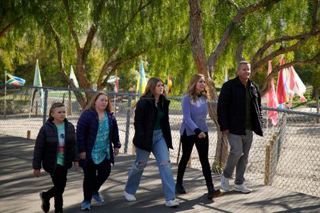 The Luhm family walks up to the Dog Psychology Center. (National Geographic)