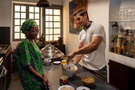 Abi Diedhiou and Antoni Porowski making lalo. (National Geographic/John Wendle)