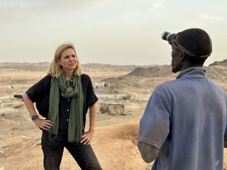 Mariana van Zeller speaks with Issoufou at Fallo Mine in Niger. (National Geographic for Disney)