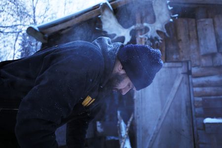 Chevie Roach cleans his traps before heading to set them on his trapline. (BBC Studios Reality Productions, LLC/Brian Bitterfeld)