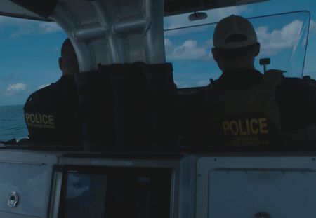 Two CBP Agents operate a water vessel in Mayaguez, PR. (Lucky 8 TV)