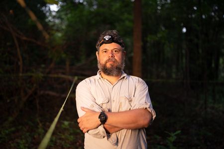 National Geographic Explorer Thiago Silva in Brazil's flooded forest in the Mamirauá Ecological Reservation.    (Photo:  National Geographic/Pablo Albarenga)