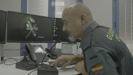 A guard in the Coordination Center is communicating in Almeria, Spain. (National Geographic)