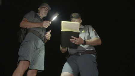 Guards check permits in Almería, Spain. (National Geographic)