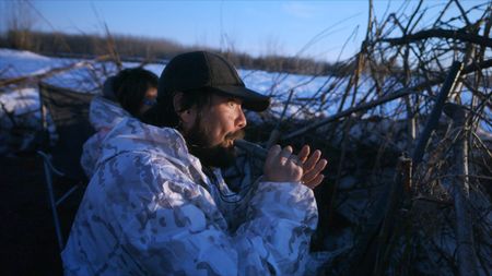 Tig Strassburg and his son, Evan, hunt for migratory waterfowl during the spring hunting season. (National Geographic)