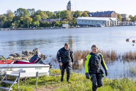 Andy Torbet and Minna Koivikkoafter diving on one of Suomenlinna's shipwrecks. (National Geographic/Ciaran Henry)