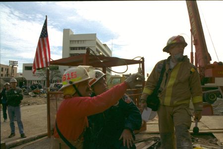 District Fire Chief Mike Shannon confers with a colleague at the site of the bombed Alfred P. Murrah Federal Building in Oklahoma City, Okla. (Danny Atchley)