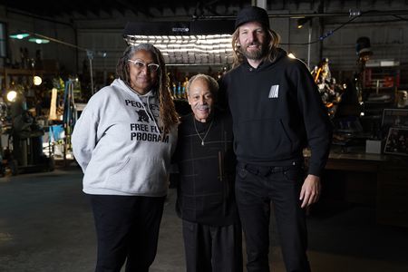 Directors Lisa CortÈs, left, and Diego Hurtado de Mendoza, right, pose with Ed Dwight during an interview in Denver. (credit: National Geographic/Ryan Dearth)