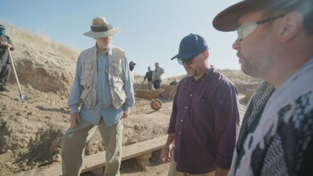 Michael Danti, William Hafford and John Macginnis observe the active dig site in Nimrud, Iraq. (Windfall Films)