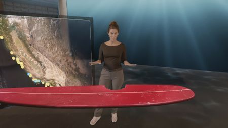 Dr. Diva Amon in the shark studio lab while analyzing a GFX version of Elinor Dempsey's, contributor, surfboard that was bitten by a Great White shark. (National Geographic)
