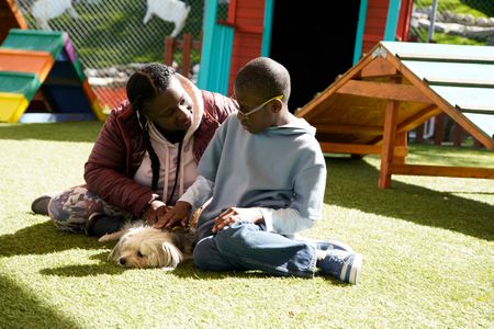 Ramona and Roman with a potential dog for their matchmaking case. (National Geographic)