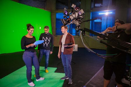 Diva Amon rehearsing in front of the green screen with director Martin Cass and Director of Photography Matthew Beckett at the studio lab shoot. (National Geographic/Aubrey Fagon)