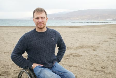 Arthur Williams is pictured on a beach in Britain for the Hythe story (National Geographic/Jahlani Clarence)