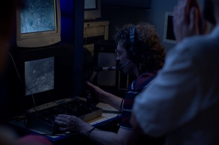 A dramatic reconstruction for "Cursed Gold: A Shipwreck Scandal" shows John Moore navigating Nemo from the ship's Control Room, revealing images of the seafloor. In 1989, maverick scientist Tommy Thompson stuns the world by recovering three tons of gold from a shipwreck deep in the Atlantic Ocean. What follows is a 30-year story of adventure, deception, and personal turmoil, taking him from venerated celebrity to infamous fugitive, and finally a defiant prisoner who refuses to give up his gold. (National Geographic)