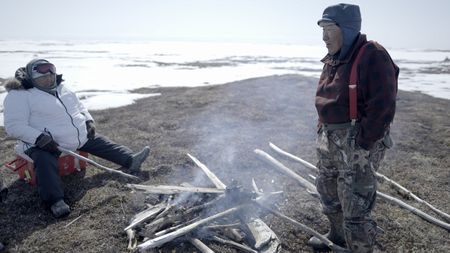 Teresa Pingayak with her husband, John Pingayak in the tundra, hunting birds and cooking dinner. (National Geographic/Matt Kynoch)