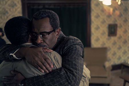Daddy King, played by Lennie James, gives Martin a hug in GENIUS: MLK/X. (National Geographic/Richard DuCree)