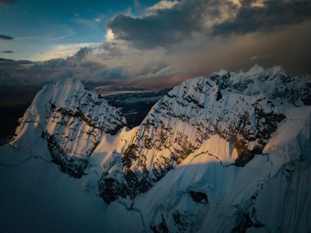 The sun sets over Nevado Ausangate in the Peruvian Andes, the source of the Amazon. (credit: National Geographic/Justen Bruns)