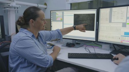 Katharina Schmidt analyzes the results of the laser particle scanner at the SESAME Laboratory. (Windfall Films/Alex Collinge)