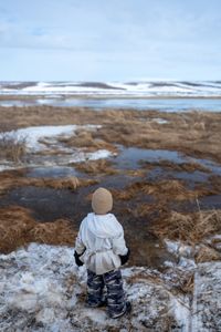 Sabastian Hailstone looks out over the waterways as migrating geese and ducks fly overhead. (BBC Studios Reality Productions/Ashton Hurlburt)