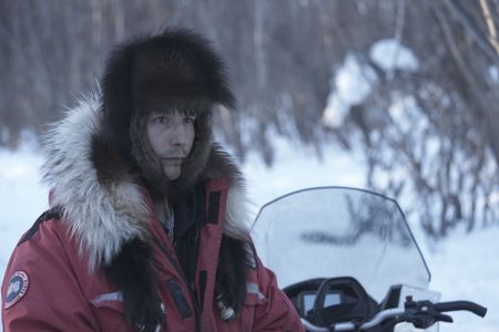 Ricko DeWilde traveling through the wilderness in the winter season on his snowmachine. (BBC Studios Reality Productions, LLC/Pedro Delbrey)