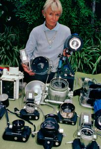 Valerie with a table full of camera equipment, in the late 1980s.  (photo credit: Ron & Valerie Taylor)