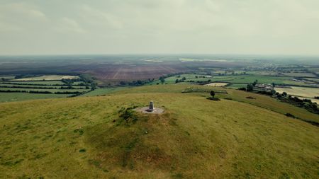 Monument on Croghan Hill and nearby bog. (2023 BOG PEOPLE SEASON ONE INC.)