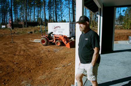Paradise, CA - Steve "Woody" Culleton outside his newly rebuilt house. (National Geographic/Sarah Soquel Morhaim)