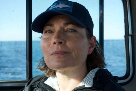 Dr. Alisa “Harley” Newton looks out to sea, hopeful to spot a baby white shark. (National Geographic/Brandon Sargeant)