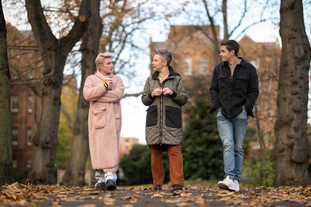 Florence Pugh, Megan Owens and Antoni Porowski walk and talk in St Pancras Gardens. (National Geographic/Chris Raphael)