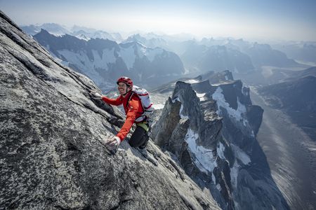 Alex Honnold climbing up the Devil's Thumb with the rest of the traverse behind him.  (National Geographic/Renan Ozturk)