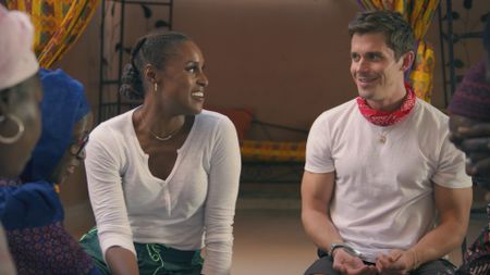 Issa Rae and Antoni Porowski are excited to taste Ceebu jÎn. (National Geographic)