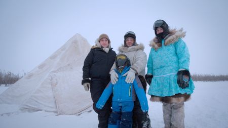 The Hailstone family in front of their tent during the winter season. (BBC Studios/Pedro Delbrey)