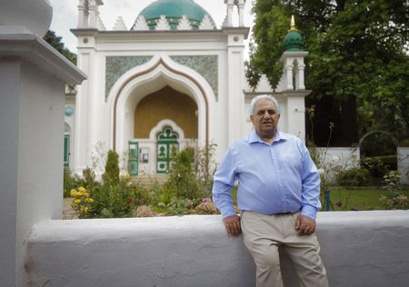 Mohammed Zubair, son of Chaudry Wali Mohammad, poses for a portrait at the Shah Jahan Mosque in London. Corporal Chaudry Wali Mohammed was a member of Force K6, an Indian Regiment of mule handlers in WW2. Amidst the chaos of Dunkirk and the advancing German Army, one little-known Indian Regiment fights for victory and independence. (National Geographic/Daniel Dewsbury)