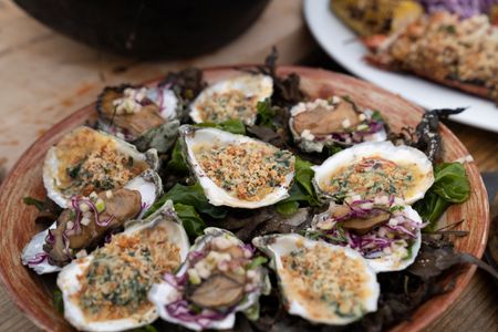 Maine - Platter of grilled oysters and Rockefeller smoked oysters with apple mignonette. (Credit: National Geographic/Justin Mandel)