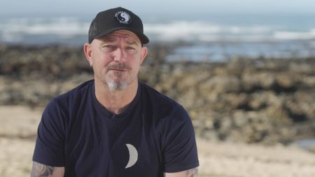 Stuart Anderson, contributor, reflecting on his day that lead up to him being bitten by a shark while out surfing on the ocean with friends. (National Geographic)