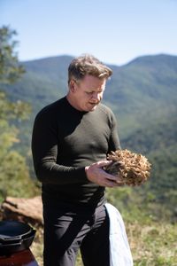 NC - Gordon Ramsay holds a beautiful Hen of the Woods mushroom during the final cook in the Smoky Mountains of North Carolina. (Credit: National Geographic/Justin Mandel)