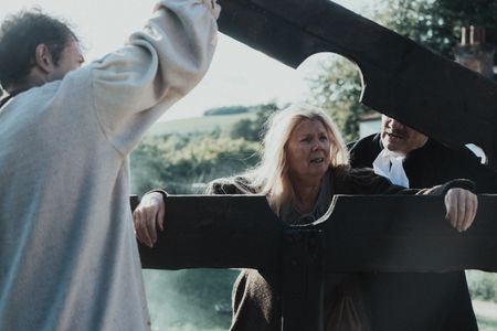 Janet Main prepares to be locked in a pillory. (Dash Productions Services LTD/Antoan Ivanov)