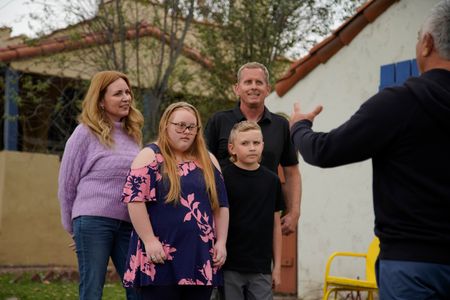 The Luhm family meets with Cesar outside their home. (National Geographic)