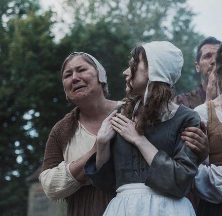 Two village women look devastated as they watch the executions. (Dash Productions Services LTD/Antoan Ivanov)