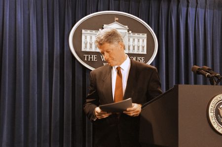 President Bill Clinton departs the White House briefing room in Washington, D.C. on April 19, 1995, after meeting with reporters to discuss the bombing of a federal building in Oklahoma City. (Marcy Nighswander/The Associated Press)