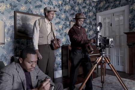Magazine reporters interview and photograph the Kings in their home in GENIUS: MLK/X. (National Geographic/Richard DuCree)