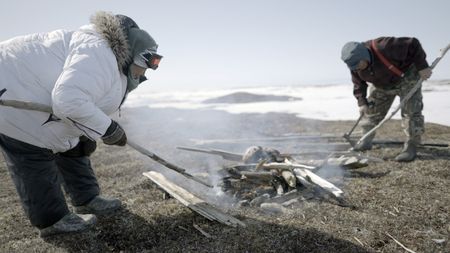 Teresa Pingayak with her husband, John Pingayak in the tundra, hunting birds. (National Geographic/Matt Kynoch)