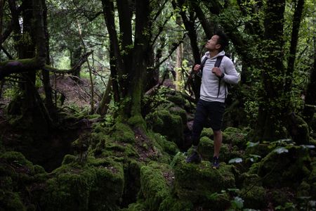 Coleford, UK - Albert Lin in a forest in Coleford, UK. (National Geographic/Hugh Campbell)