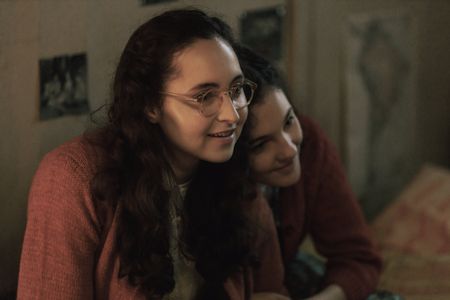 A SMALL LIGHT - Ashley Brooke as Margot Frank and Billie Boullet as Anne Frank in A SMALL LIGHT. (Credit: National Geographic for Disney/Dusan Martincek)