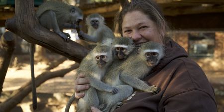 Belinda holding a group of monkeys. (Big Wave Productions)