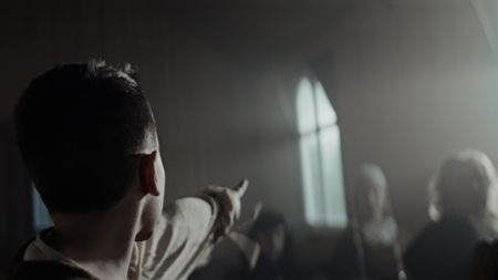 Afflicted boy pointing at a window in the church. (Dash Pictures/Samuel Purcell, Oliver Watts)