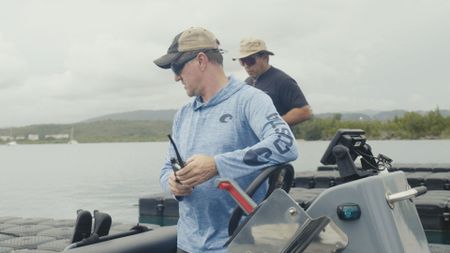 CBP AMO Agents dress in civillian attire and take a shallow boat out to get a closer look at a suspected smuggling route in Fajardo, P.R. (Lucky 8 TV/Ivan Leon)